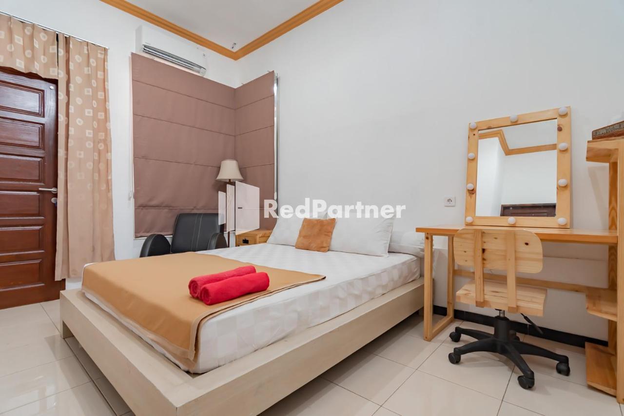 Langkar Guest House Syariah Mitra Reddoorz Samarinda Exterior foto