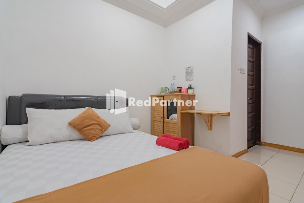 Langkar Guest House Syariah Mitra Reddoorz Samarinda Exterior foto