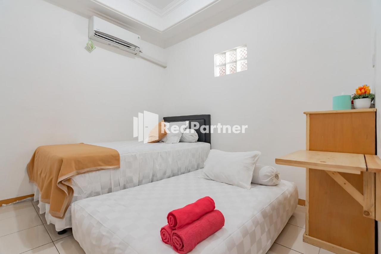Langkar Guest House Syariah Mitra Reddoorz Samarinda Exterior foto