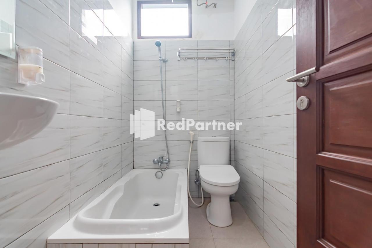 Langkar Guest House Syariah Mitra Reddoorz Samarinda Exterior foto